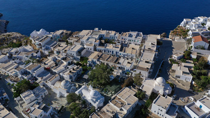 Aerial drone photo of picturesque main village (chora) of Folegandros island featuring uphill...