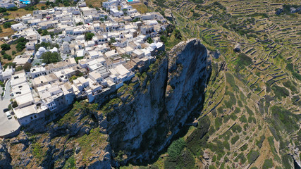 Aerial drone photo of picturesque main village (chora) of Folegandros island featuring uphill...