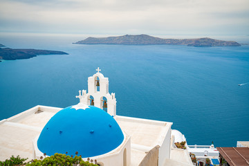 Obraz premium Church at Santorini Island in Greece, one of the most beautiful travel destinations of the world.