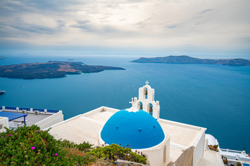 Fototapeta premium Church at Santorini Island in Greece, one of the most beautiful travel destinations of the world.