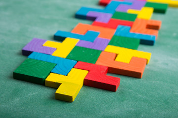 Creative solution for idea - business concept, jigsaw puzzle on the blackboard