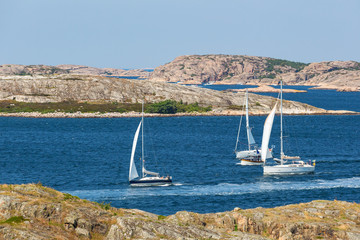 Sailboats in the rocky archipelago in the Swedish west coast