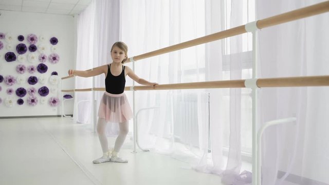 Pretty Little Ballerina In Pointe Practicing Dance At Classical Ballet School