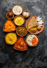 group of Indian Sweet / mithai in terracotta bowl