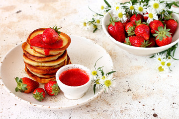 Pancakes with strawberry syrup