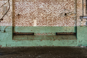 Painted brick wall in abandoned factory