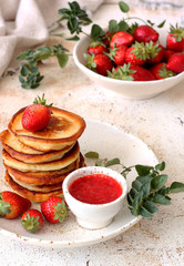 Pancakes with strawberry syrup