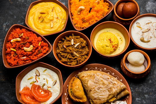 Group Of Indian Sweet / Mithai In Terracotta Bowl