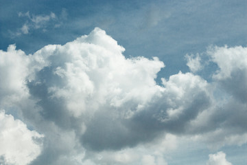 Naklejka na ściany i meble beautiful white clouds against the blue sky with a trace of the plane