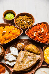 group of Indian Sweet / mithai in terracotta bowl