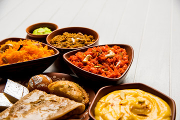 group of Indian Sweet / mithai in terracotta bowl