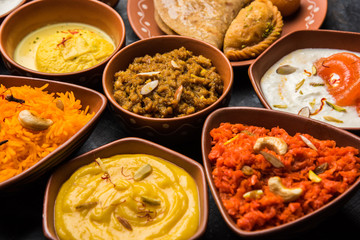group of Indian Sweet / mithai in terracotta bowl