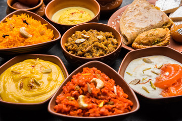 group of Indian Sweet / mithai in terracotta bowl