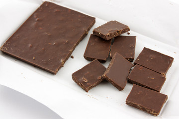 pieces of chocolate on white background
