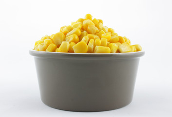 corn in a bowl isolated on white background