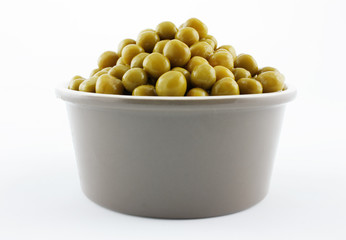 green peas in a bowl isolated on white