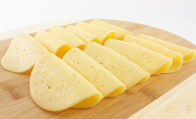 cheese on a wooden board