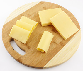 cheese on a wooden board