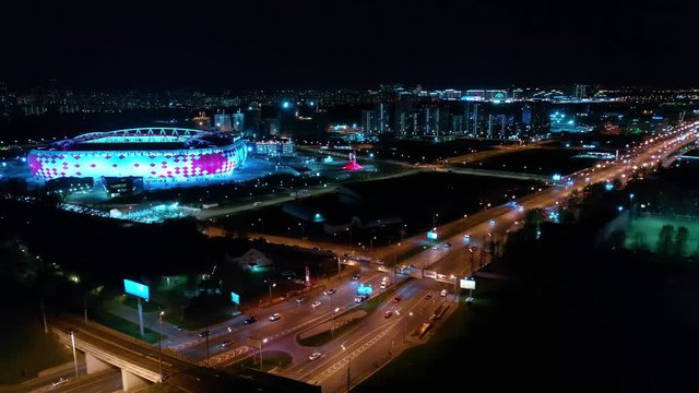 Night Aerial view of a freeway intersection and football stadium Spartak Moscow Otkritie Arena