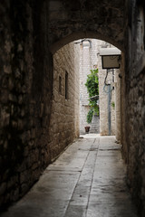 Old and empty medieval street in Trogir, Croatia