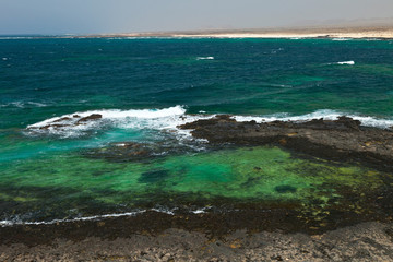 Bajos de El Tostón junto al faro de El Tostón. Punta Ballena. Parque Natural de Corralejo. Isla...