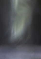 White smoke, abstract shapes on a black background