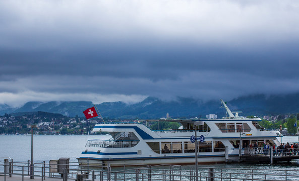Boat on the Zurich Lake. Pier in Zurich