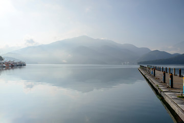 Fototapeta na wymiar Dramatic morning over Sun Moon Lake, natural landscape background Taiwan