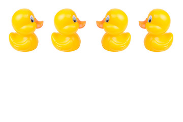 Plastic yellow duck toy isolated on white background