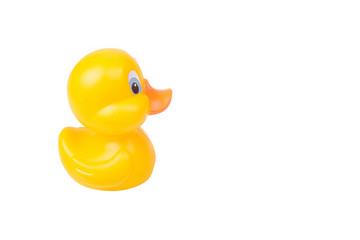 Plastic yellow duck toy isolated on white background