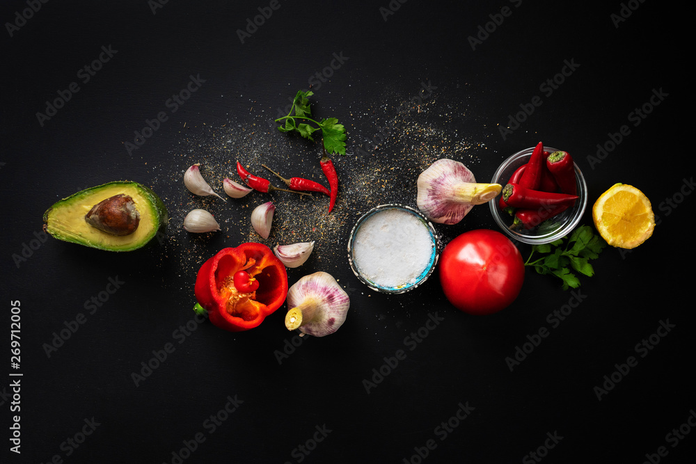 Wall mural top view of fresh guacamole ingredients, natural organic vegetables on the table, home cookings