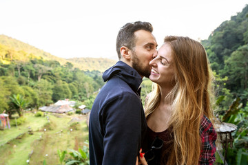 couple in love with the mountains in the tropics