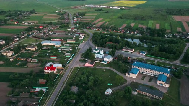 Korma Village, Dobrush District, Belarus. Aerial View Of City Cityscape Skyline With St. John The Korma Convent Church In Korma Village. Famous Orthodox Church