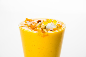 Falooda / Faluda is a popular Indian dessert - Strawberry and Mango flavoured which has Ice cream, noodles, sweet basil seeds and nuts, selective focus