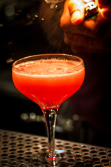 red cocktail in the bar