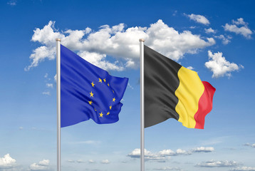European Union vs Belgium. Thick colored silky flags of European Union and Belgium. 3D illustration on sky background. - Illustration