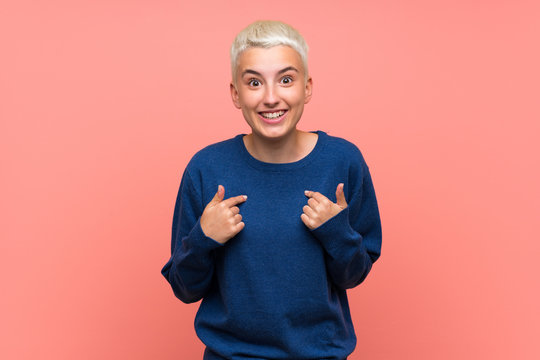 Teenager Girl With White Short Hair Over Pink Wall With Surprise Facial Expression