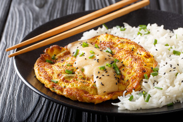 Egg Foo Young - Easy, homemade recipe filled with ground pork, carrot and bean sprouts with rice...