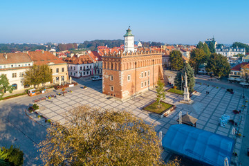 Sandomierz old city, Poland. Aerial view in sunrise light. Gothic city hall with clock tower and...