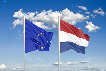 European Union vs Netherlands. Thick colored silky flags of European Union and Netherlands. 3D illustration on sky background. - Illustration