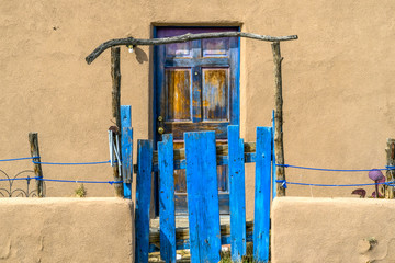 Fototapeta na wymiar blue door in old house