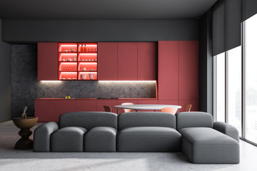 Red kitchen and living room interior