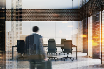 Businessman entering office meeting room