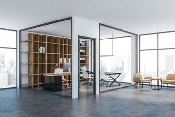 Glass wall manager office corner with lounge