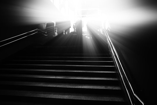 Diagonal black and white city stairs with dramatic light background hd