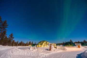 Northern lignt in Finland over Igloo house 