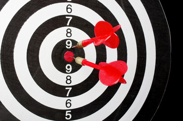 Dartboard and stuck arrows