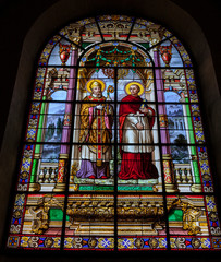Fototapeta na wymiar Stained glass. St. Desideratus and St. Carlo Bartolomeo