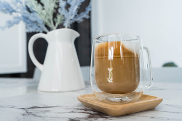 Obraz na płótnie Canvas Coffee with vase on table 