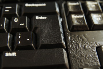 typing on a laptop computer keyboard close up